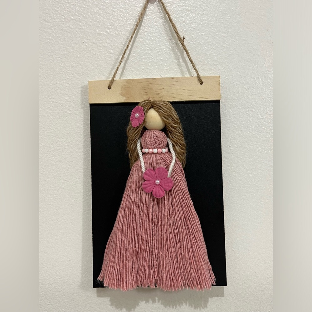 Handmade macrame doll wall decor